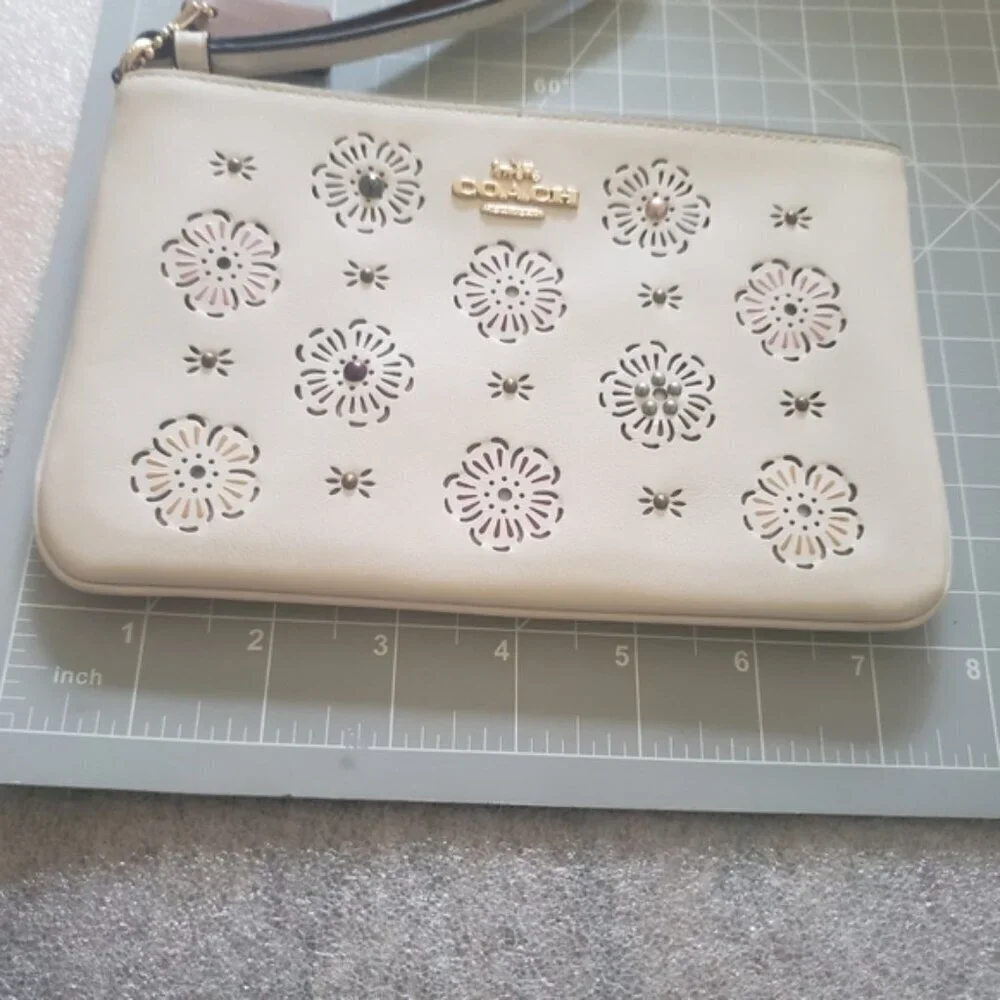 Coach White Leather Wristlet with Cut Out Tea Rose